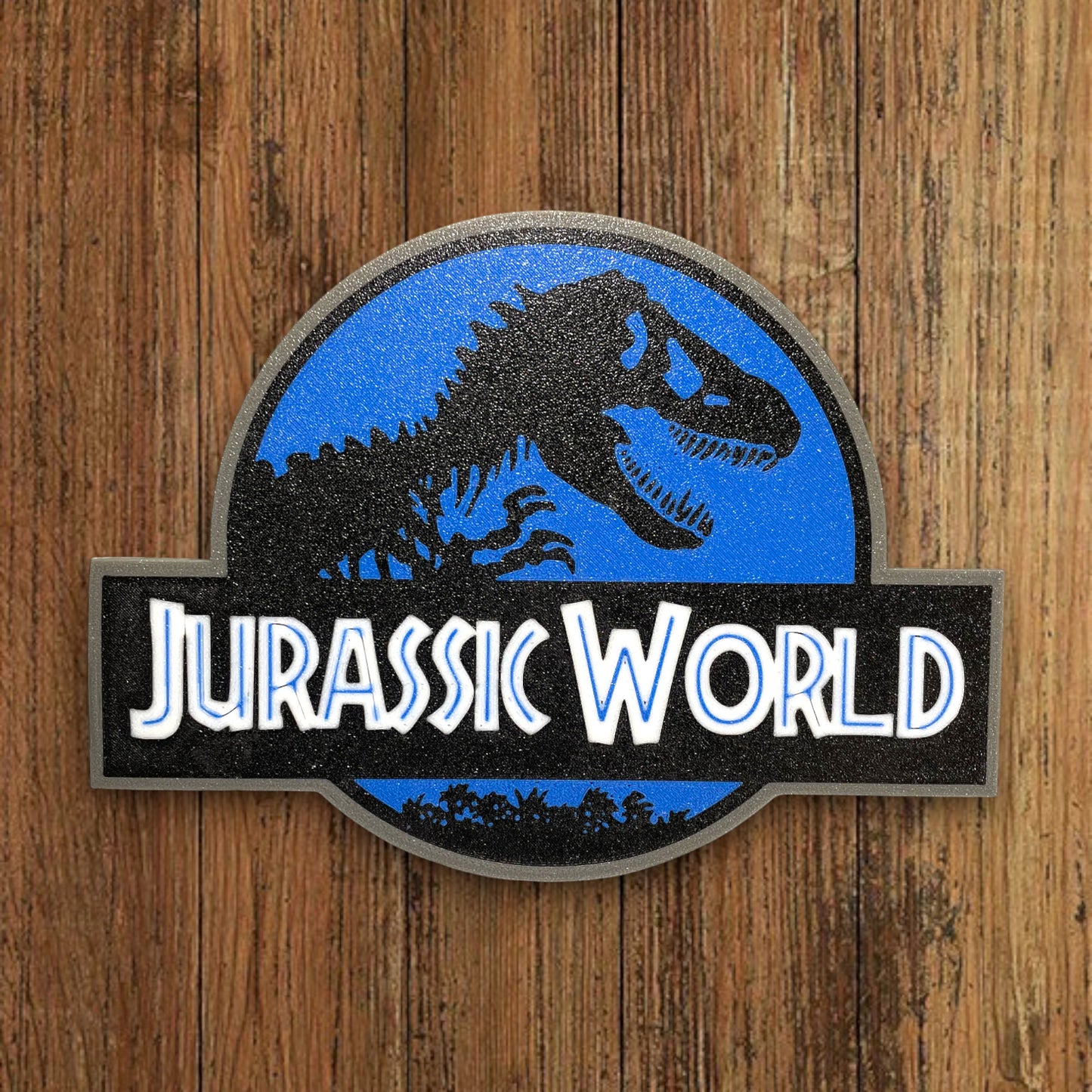 🦖 Plaque Murale 3D Jurassic World dim 20x15cm - Logo Geek & Pop Culture